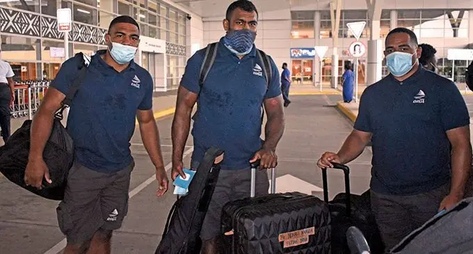 Fijian Drua players (left-right) Apisalome Vota, Nemani Nagusa, Meli Tuni at Nadi International Airport on November 4, 2021. Photo: Waisea Nasokia