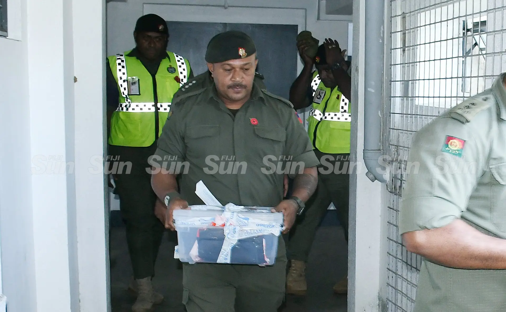 Military Police officers immediately transferred the exhibits, including a revolver pistol, a short gun, an empty magazine and 77 rounds of ammunition.