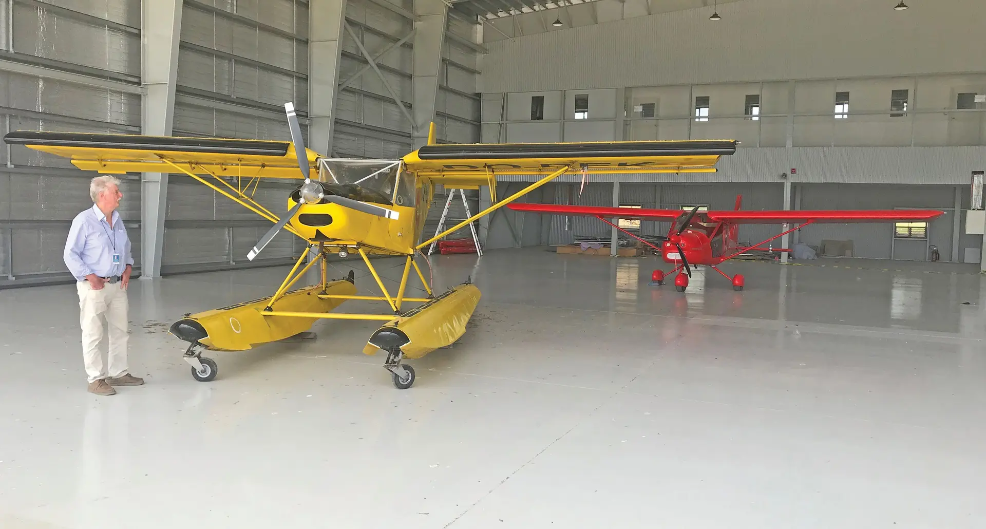 Advance Aviation Training (Fiji) Pte Ltd managing director and Chief Flying Instructor, Captain Wayne Hinton at the new state of the art training school, hangar and office complex in Nadi. The two aircraft in view are the Zenith Aircraft CO- STOL CH 701  and an Aeroprakt-32 on October 30, 2020.