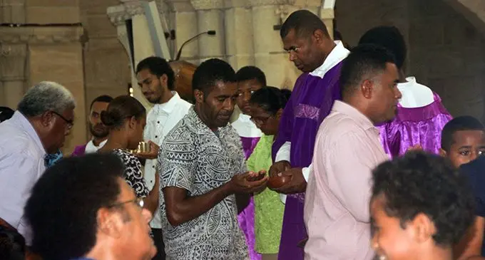 Church members during Holy Communion service at the Sacred Heart Cathedral in Suva on March 8, 2020. Photo: Shreeya Verma