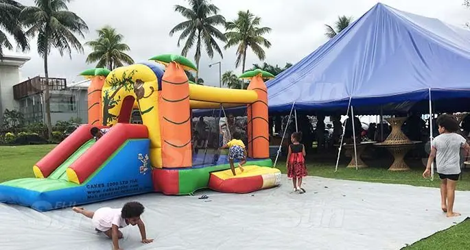 The bouncy castle at Suva Bowling Club is part of the Sunday market day. It allows parents to sell their goods while the children frolick in a safe space. Photo: Frederica Elbourne.