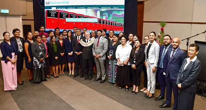 Attorney-General’s chamber and office staff with outgoing Chief Justice Anthony Gates (with garland) flanked by Permanent Secretary of Justice Sharvada Sharma (left) and Attorney-General Aiyaz Sayed-Khaiyum (right) during the launch of the Laws of Fiji website at the Grand Pacific Hotel in Suva on March 29, 2019. Photo: DEPTFO NEWS. 