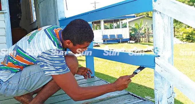 Natabua Under 19-21 Rugby club members paint the Natabua Community post on March 28, 2022. Photo: Salote Qalubau