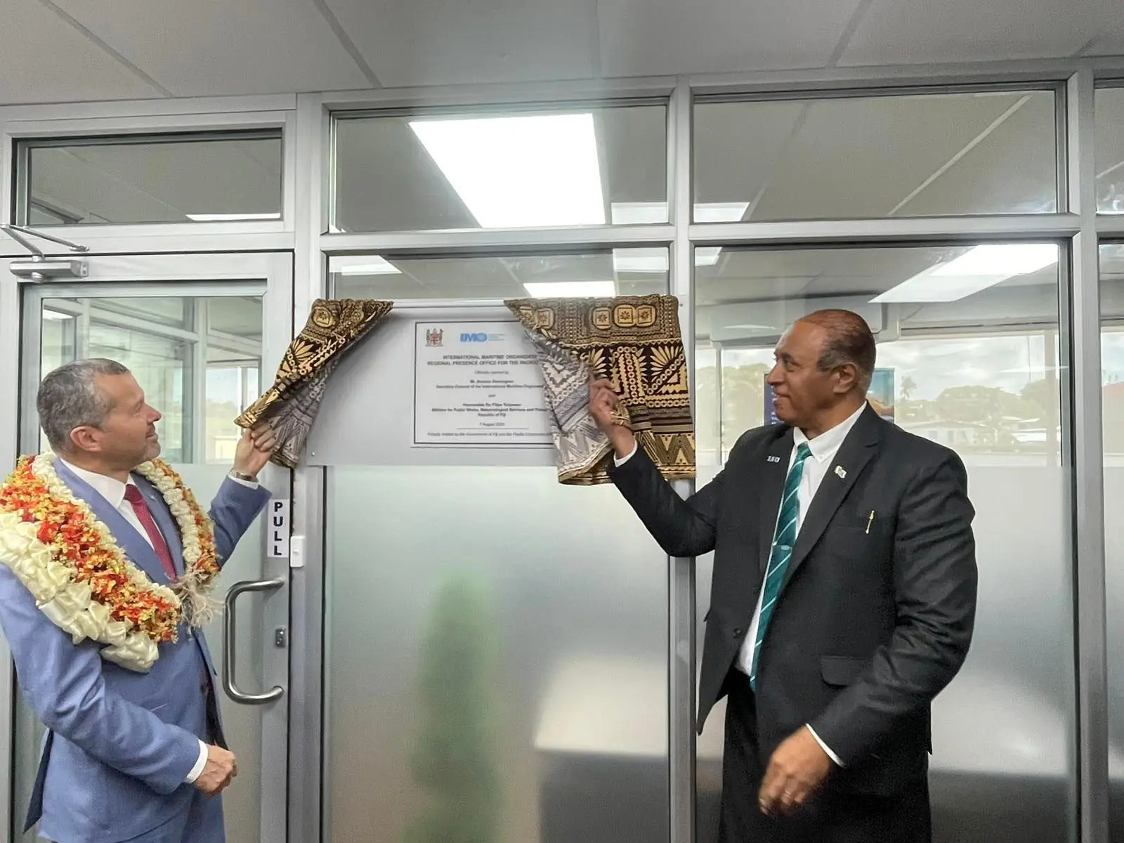 From left, Arsenion with Minister Tuisawau 