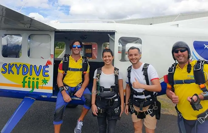 From left: Tandum instructor Sebastian Aresca, Anisa Bourkerehe, Thomas Belibio and instructor Calder Chernoff ready for another sky divng flight in Suva.