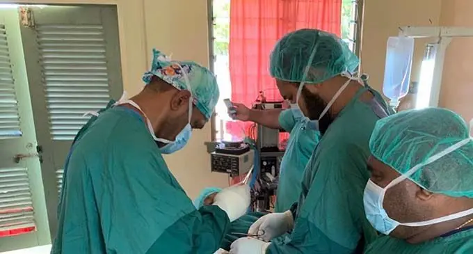 Colonial War Memorial Hospital General Surgeon, Dr Ilatia Delasau operating on a patient in Moala Health Centre, Lau.