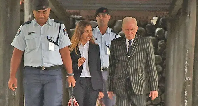 Commission of Inquiry Counsel (COI) Assisting Janet Mason engages (second from left) in conversation with COI sole commissioner Justice David Ashton-Lewis after day three of the hearing at the Old Parliament Complex in Veiuto, Suva on January 8, 2025. Photo: Jone Salusalu