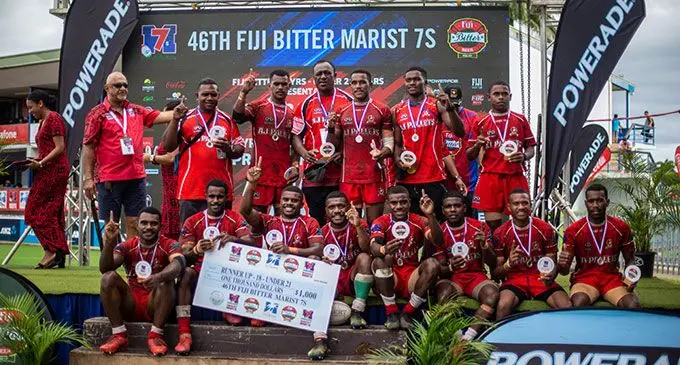 AJ Pallets Ba River Under-21 players and officials receive their runners-up prize during the Fiji Bitter Marist 7s tournament at the ANZ Stadium, Suva, on March 26, 2022. Photo: Leon Lord