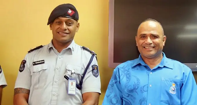 Inspector Ulaiasi Tamanisau (left) with the Commissioner of Police, Brigadier General Sitiveni Qiliho