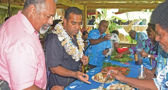  Minister for Rural Maritime Development Sakiasi Dotoka (left) and Minister for Lands and Acting Health Minister Filimoni Vosa-rogo during traditional food exhibition at Veikau Lodge in Nawaqabena Village, Naitasiri on October 20, 2023.   Photo: Ronald Kumar