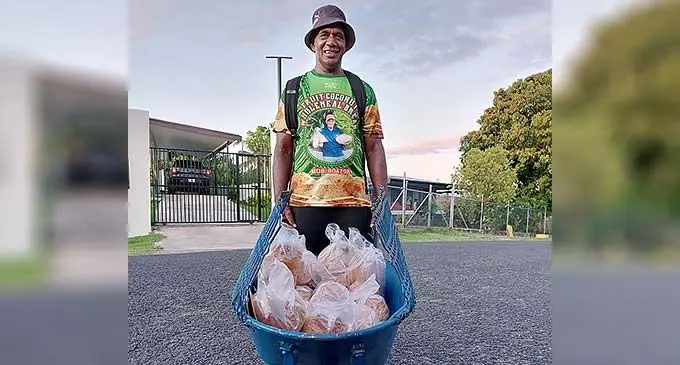Sailosi Siriva with his wheelbarrow-filled loaves of bread at Lum Street in Waiyavi, Lautoka on December 14, 2022. Photo: Nicolette Chambers