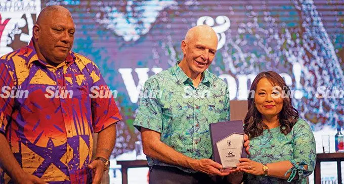 From left: President Ratu Wiliame Katonivere, former New Zealand 7s rugby coach Sir Gordon Tietjens and Legend Sportswear director Mandy Qi during the Fiji Rugby League Launch at the Grand Pacific Hotel, Suva, on May 26, 2022. Photo: Leon Lord