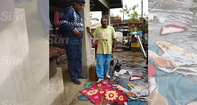 Qarase Settlement, Nadera resident, Umesh Chand with some of his household items and Southern Division Community Policing Inspector Dansy Ravu on October 8, 2019. Photo: Ronald Kumar