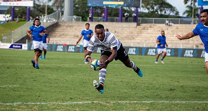 Swire Shipping Fijian Warriors fullback Jack Volavola runs over to score a try against Manuma Samoa after being set-up by Simione Kuruvoli during their clash at the HFC Bank Stadium, Suva, on August 27, 2022. Volavola was one of our standout players in this year’s Skipper Fiji Rugby Championship and he has impressed Flying Fijians head coach Vern Cotter. Photo: Leon Lord