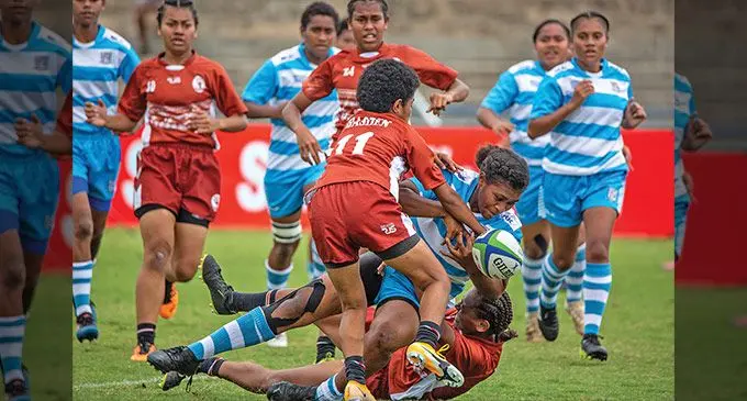 Lomary Secondary School Under-18 centre, Vani Delai (with ball), is stopped by players of Basden College during their Southern Zone’s Weet-Bix Raluve Trophy match at the HFC Bank Stadium, Suva, on August 27, 2022. Photo: Leon Lord