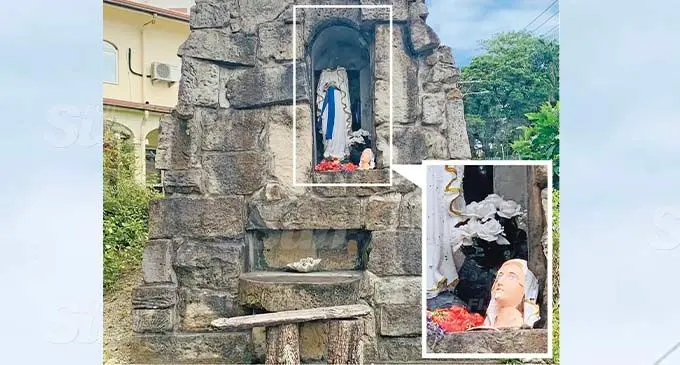 The damaged statue of Mother Mary at the Sacred Heart Cathedral in Suva on November 11, 2020. INSET: The decapitated head of Mother Mary’s statue. Photos: Fernando Lobendahn