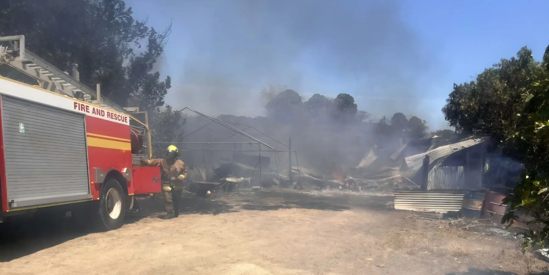 Firefighters contain the blaze at a vacant property in Votualevu, Nadi, on September 28. 