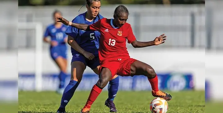 Papua New Guinea midfielder Michaelyre Butubu shields the ball away from Samoa’s Oteta Kitiona during their Group A clash of the OFC Women’s Nations Cup at Lautoka’s Churchill Park on July 4, 2025. Photo: OFC Media