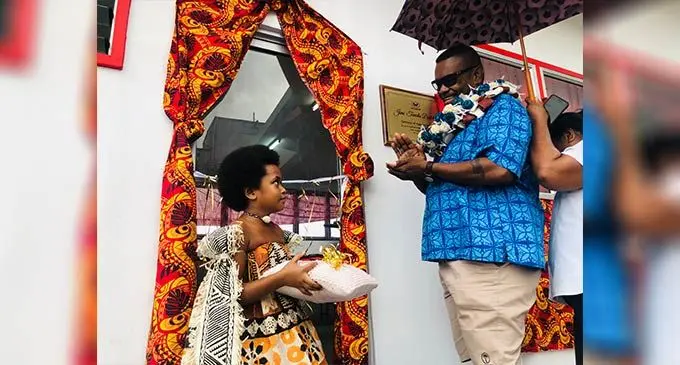 Right: FMF Foods Limited group operations manager, Jimi Taniela unveils the building named after him as a reward for his loyal and dedicated service. Photo: Shreya Verma.