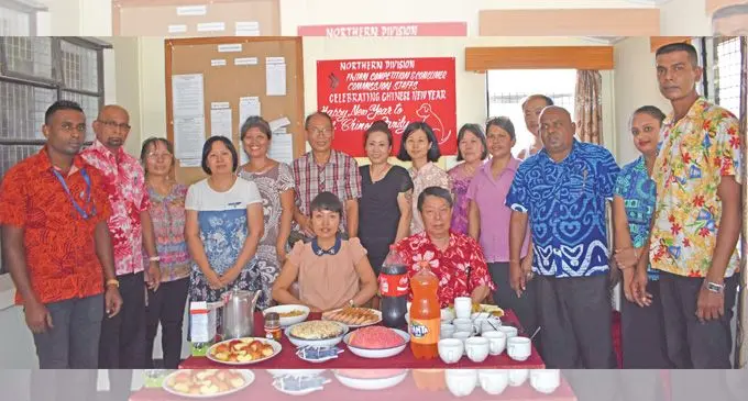 Fijian Competition and Consumer Commission northern regional manager Sheik Yusuf (second from the left) with his staff and Chinese community in Labasa celebrate Chinese Near Year on February 16, 2018. Photo: Shratika Naidu