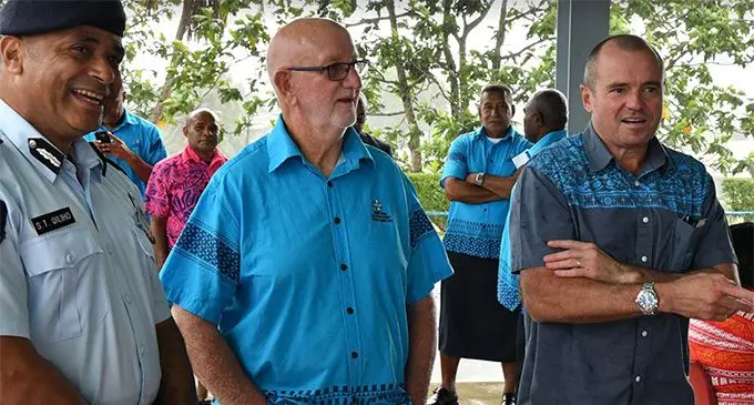 Johnny Lewis with the Commissioner of Police  Brigadier General Sitiveni Qiliho and Australian High Commission John Feakes.