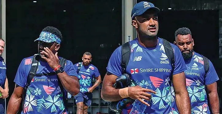 From left: Kalaveti Ravouvou, Eroni Sau (back), Etonia Waqa and Samuela Tawake walking out of their base at Legalega, Nadi on May 27, 2023. Photo: Fijian Drua Media