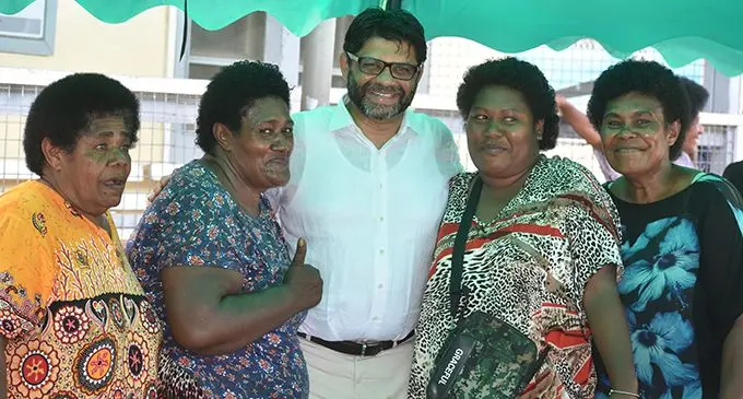 Market vendors poses for a picture with the Minister for Economy. March 2,2019.Photo Laisa Lui 