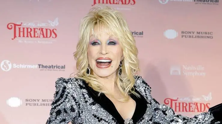 Dolly Parton put on a brave face in her first appearance since her husband's death. (Image: Getty)