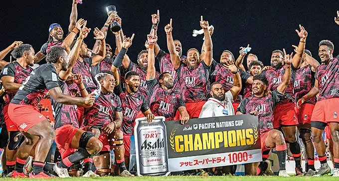Flying Fijians celebrate as they hoist the Pacific Nations Cup on Saturday after defeating Japan 41-17 in the final. Photo: AFP