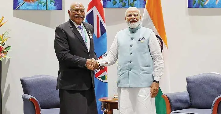 Prime Minister Sitiveni Rabuka with India’s Prime Minister Narendra Modi at Papua New Guinea. Photo: Arindam Bagchi (Twitter)