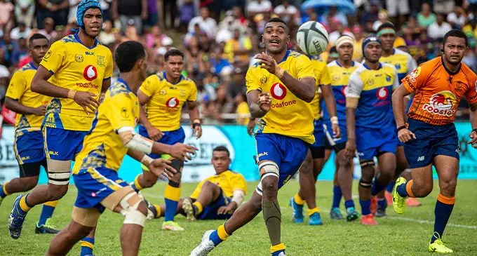 Suva Grammar School Under-18 centre Isaac Rabaka flicks a pass during the Vodafone Super Deans Trophy National semi-final against Natabua High School at Prince Charles Park, Nadi, on October 1, 2022.Photo: Leon Lord