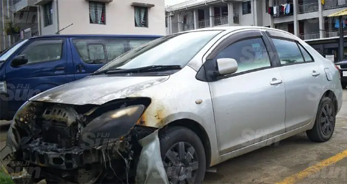 A private car that was allegedly set alight at the Public Rental Board Raiwai flats car park . Photo: Ronald Kumar