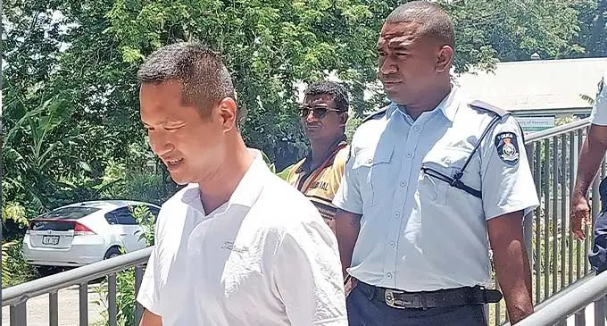Grace Roads president Daniel Kim is escorted to the Tagimoucia Court complex in Lautoka. Photo: Salote Qalubau