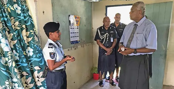 Minister for Home Affairs and Immigration Pio Tikoduadua communicating with the Wailevu Police Community Post Corporal Maria Vunivesilevu at Wailevu Village in Cakaudrove on April 12, 2023. Photo: Shratika Naidu