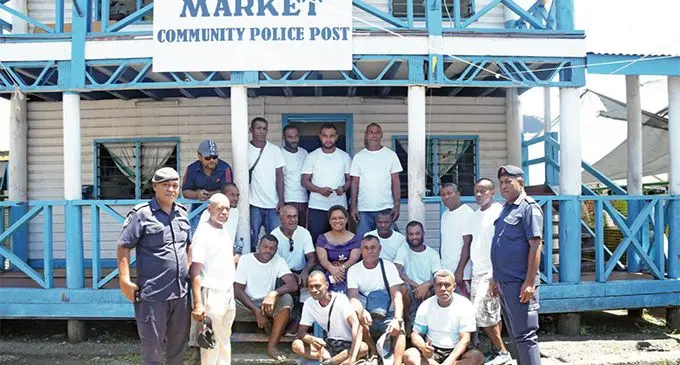 Minister for Women, Children and Poverty Alleviation Mereseini Vuniwaqa (middle) with the members of the Wheelbarrow Association at the Suva Market Police Post in Suva on March 8, 2019. Photo: Ministry of Women, Children and Poverty Alleviation