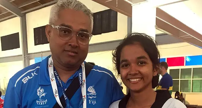 Proud moment for Nimesh Narayan (left) with daughter Anegha after shoe won the silver medal during the  Pacific Games in Apia, Samoa on July 17.2019. Photo: Anasilini Natoga