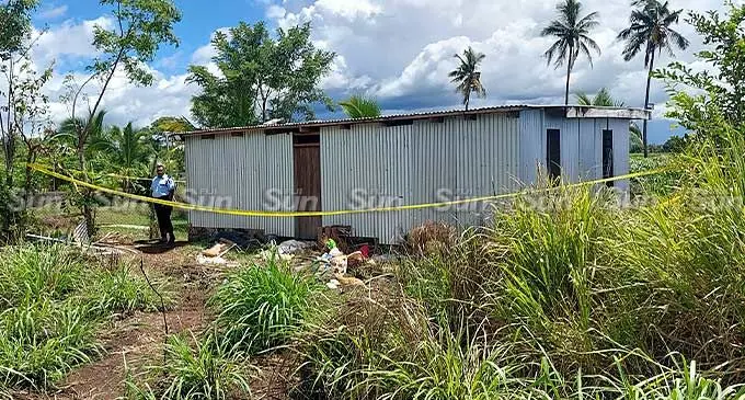 A Police officer has been stationed at the house in Legalega, Nadi, where the three-tonne drug bust took place. Photo: Salote Qalubau