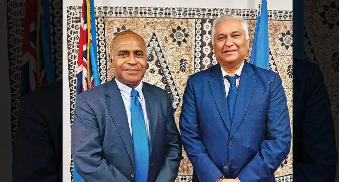 Lieutenant-Colonel (Ret’d) Filipo Tarakinikini with Dr Satyendra Prasad.