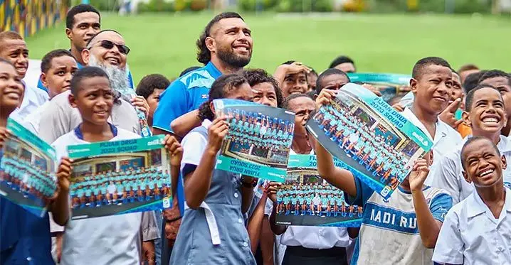 Swire Shipping Fijian Drua forward Haereiti Hetet among students during the Shop N Save Super Rugby Pacific 2023 launch at Nawaka District School, Nadi, on February 14, 2023. Photo: Drua Media