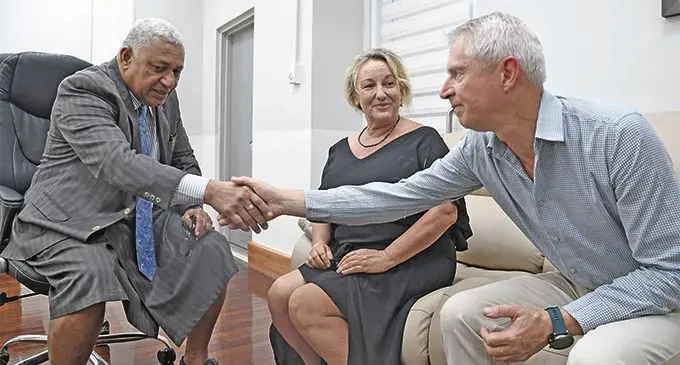Prime Minister Voreqe Bainimarama with Newsroom.co.nz investigations editor Melanie Reid (middle) and co-editor Mark Jennings at the Government Office in Parliament on April 4, 2019. Photo: DEPTFO News