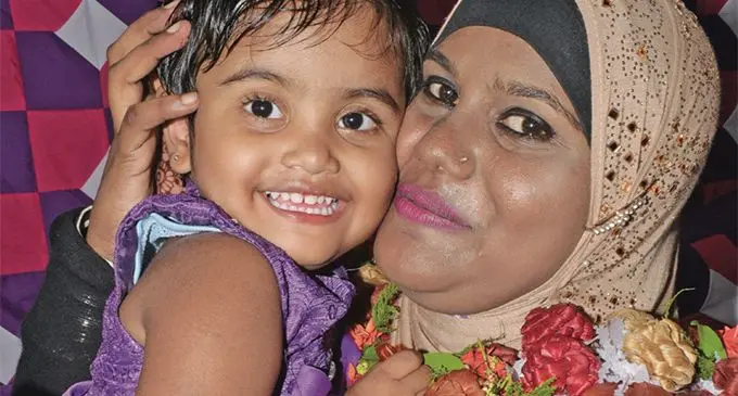 Anisha Banu with her daughter Nazifa Raza after her graduation from the Makoi Women’s Vocational Training Centre on March 7, 2019. Photo: Ronald Kumar