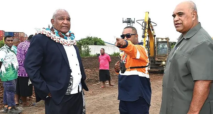 Minister for Forestry Kalaveti Ravu (left) with Fiji Pine group chairman Rakuita Vakalalabure, at Lautoka Tropik Port yesterday where the first 2000-tonne pine load arrived from Muani, Kadavu. Photo: Salote Qalubau