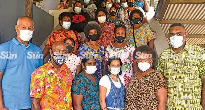Fiji Commerce and Employers Federation (FCEF) chief executive officer (CEO) Kameli Batiweti with the Nadi market vendors and market master, Ilami Lutumailagi at the Nadi Town Council office. Photo: Mereleki Nai