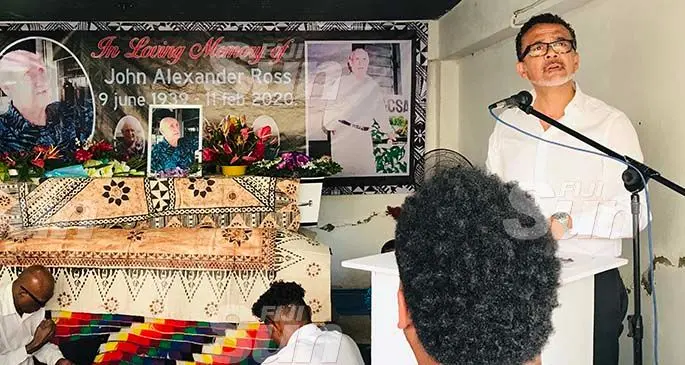 Tony Whitton leads the funeral service for John Ross at Nasoso, Nadi, yesterday Photo: Charles Chambers