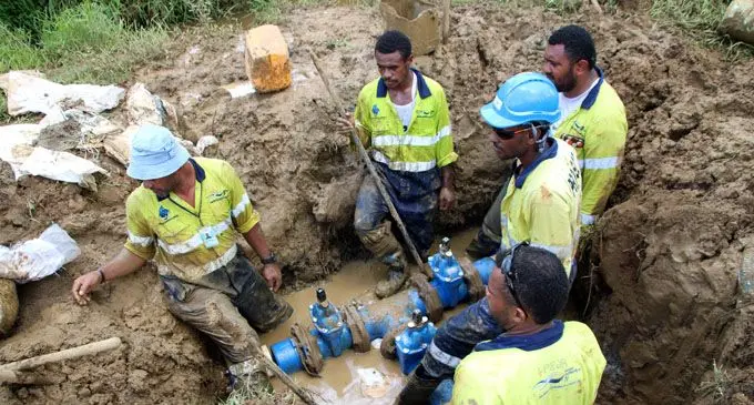 Water Authority of Fiji (WAF) crew members conduct installation works at the injection point at Suvalailai to boost water supply to the Burebasaga area. Photo: WAF