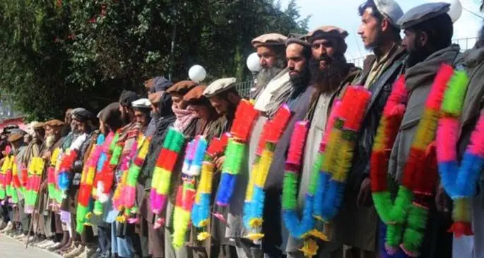 Islamic State (IS) militants take part in a surrender ceremony in Kunar province, Afghanistan, March 1, 2020.(Xinhua/Emran Waak)