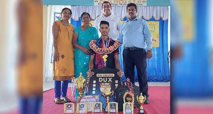 DAV College, Ba Dux and head boy, Ravneel Vikash Deo Maharaj (front), with his mother, Josephine Mala (first from left), grandmother, Ambika Devi (second from left), Rooster Poultry chief executive officer, Stanley Raniga and the college principal, Sanjesh Kumar at the school’s investiture ceremony in Ba on November 17, 2022. Photo: Nicolette Chambers