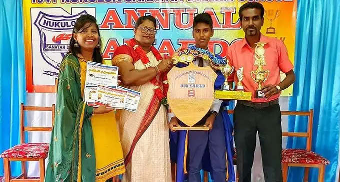 From left: Deepti Darshani Devi (Nishil’s mother), chief guest Prateeka Goundar, Nukuloa Sanatan Dharam Primary School dux Nishil Rishab Karan and Davendra Karan (Nishil’s father). Photo: Waisea Nasokia