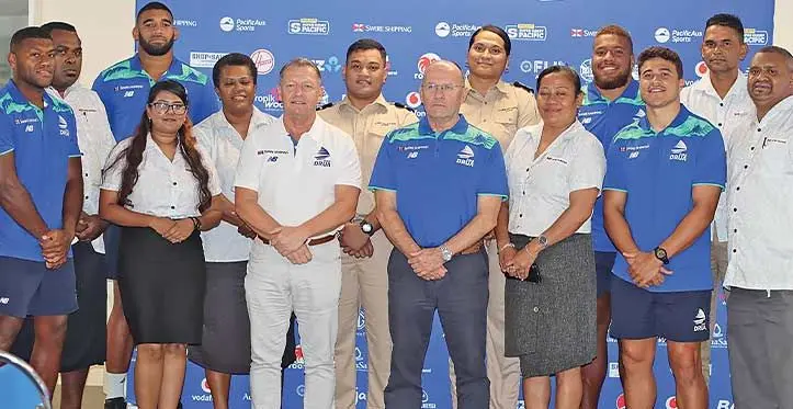 Swire Shipping regional manager for the Pacific Islands Alex Pattison (front, second from left) and Fijian Drua chief executive officer Mark Evans with company staff and players at the Drua homebase in Legalega, Nadi on May 31, 2023. Photo: Fijian Drua