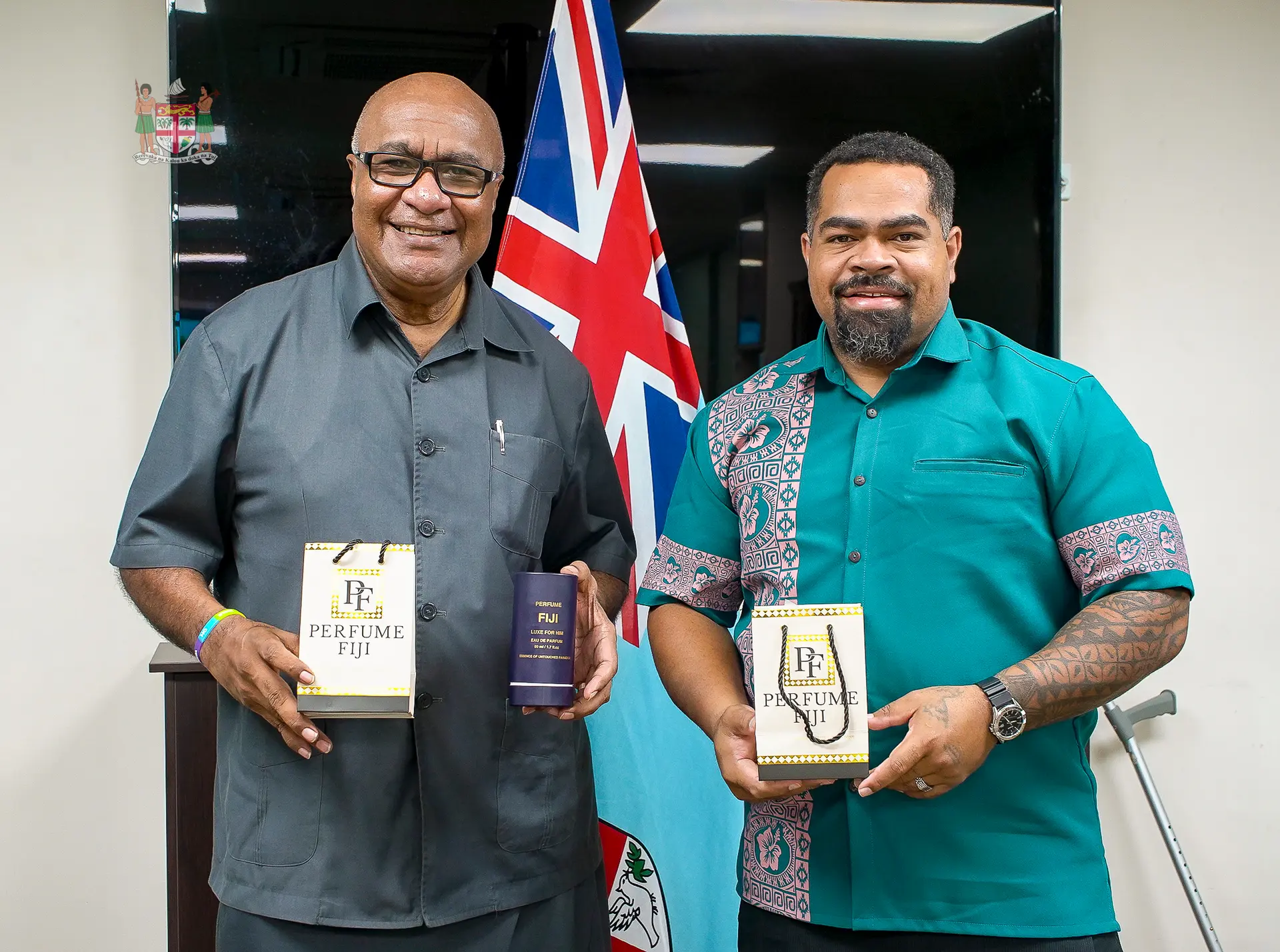 Minister for Industries, Commerce and Business Development Manoa Kamikamica (left) and Perfume Fiji founder Rupeni Rokoratu showcase Perfume Fiji products.